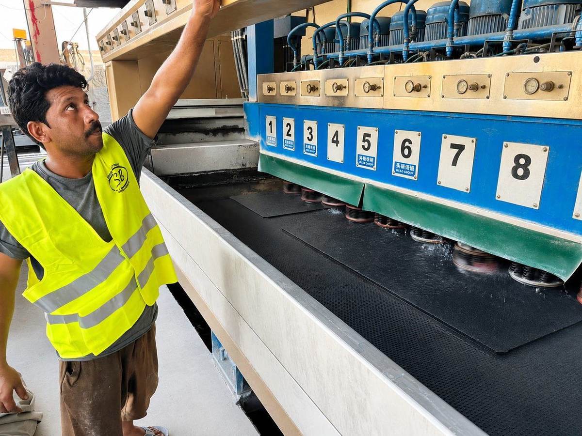 Technician overseeing the CNC cutting line, Saqib Brothers Lahore